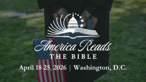 Promo banner for 'America Reads The Bible' with a Bible, U.S. flag, and capitol graphic, listing dates and Washington, D.C.